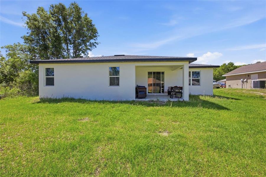 Exterior details and patio area of a home in , Ocala (Image 23).