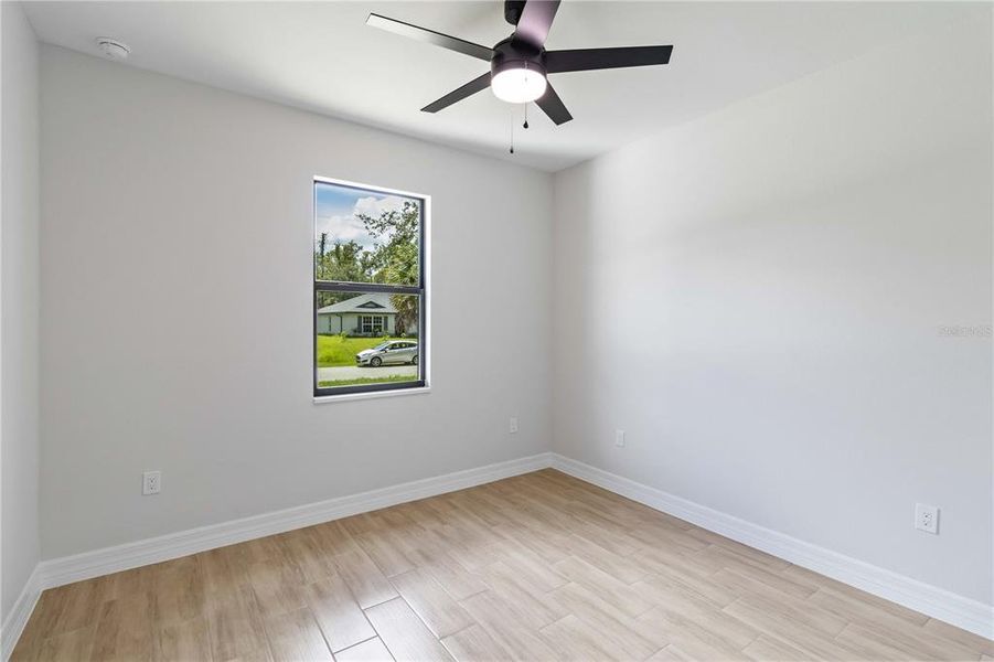 Spacious, unfurnished interior of a new home in , Port Charlotte (Image 21).