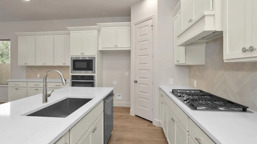 Furnished interior view inside a new home in The Woodlands Hills 40', Willis (Image 4). Furnished interior view inside a new home in The Woodlands Hills 40', Willis (Image 4).