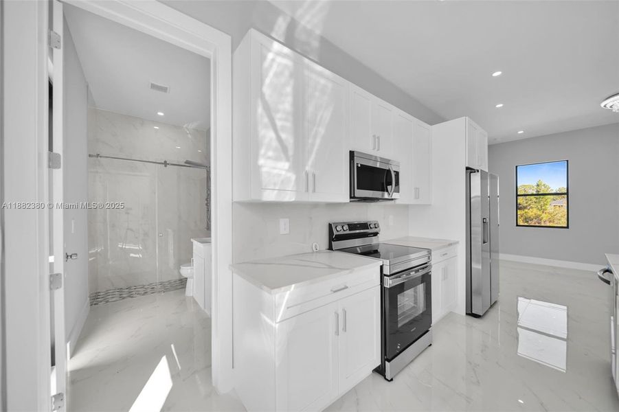 Furnished interior view inside a new home in , Lehigh Acres (Image 10).