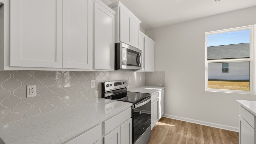 Representative furnished interior of a home built from the Galen by D.R. Horton in Fox Crossing, Griffin (Image 10).