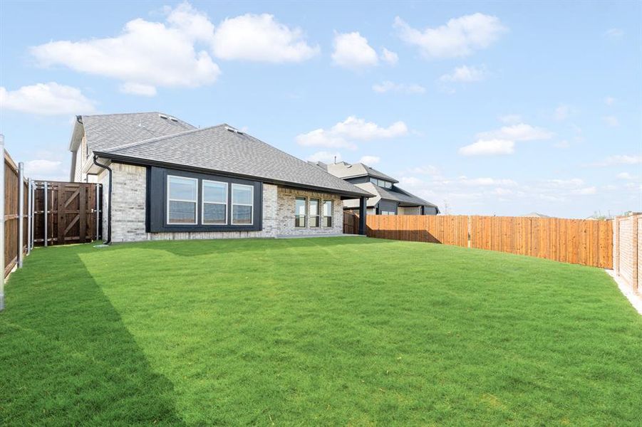 Exterior details and patio area of a home in Devonshire, Forney (Image 21).