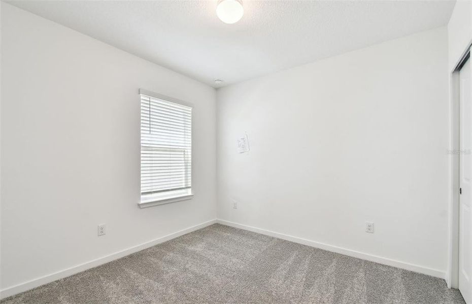 Spacious, unfurnished interior of a new home in Oakfield Lakes, Parrish (Image 13).