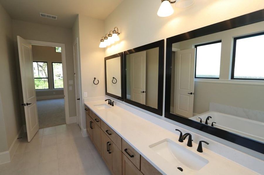 Furnished interior view inside a new home in Sienna 65' Homesites, Missouri City (Image 8).