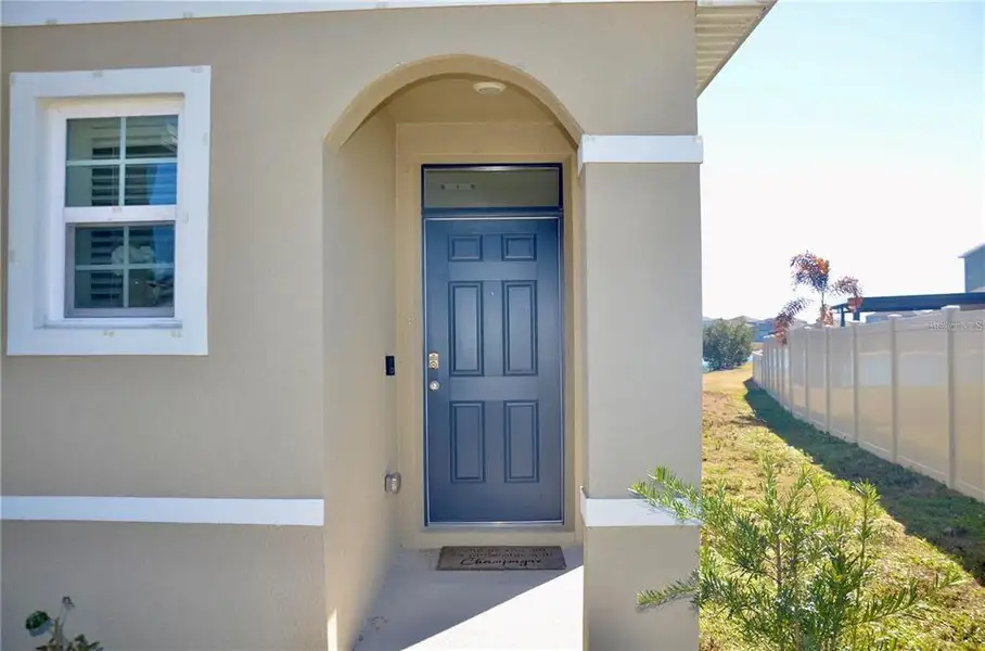 Exterior details and patio area of a home in , Davenport (Image 3).