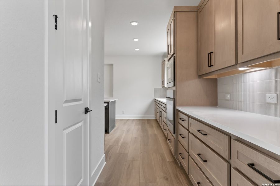 Furnished interior view inside a new home in Megan's Landing, Castroville (Image 12).