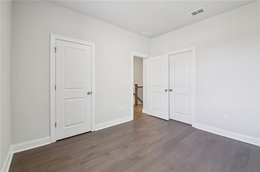 Spacious, unfurnished interior of a new home in Ward's Crossing Townhomes, Johns Creek (Image 28).