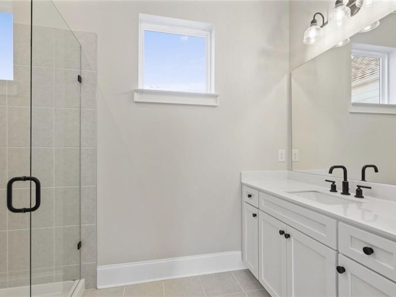 Furnished interior view inside a new home in The Village at Towne Lake, Woodstock (Image 17).