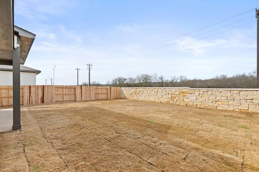 Exterior details and patio area of a home in Lagos Reserve, Manor (Image 24).