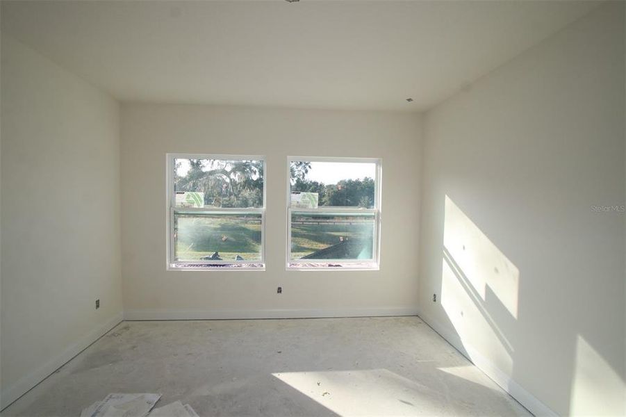 In-progress construction of a new home in Oakfield at Mount Dora Village Series, Mount Dora, FL (Image 7).