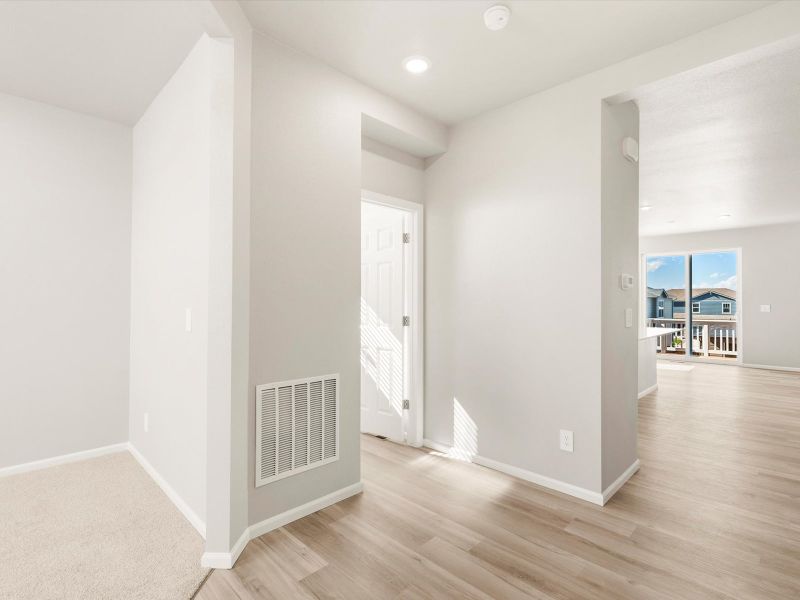 Spacious, unfurnished interior of a new home in Buffalo Highlands: The Flora Collection, Commerce City (Image 11).