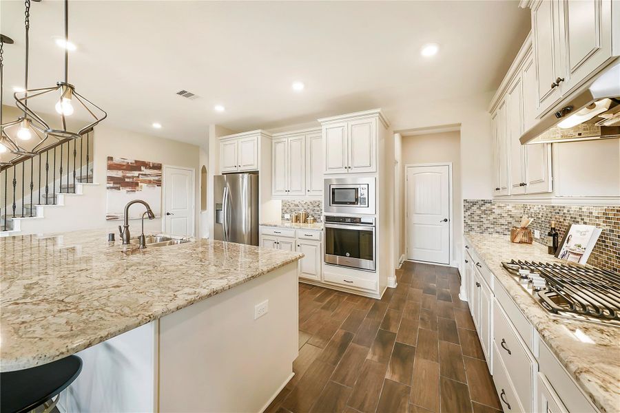Furnished interior view inside a new home in Valencia: Hilltop Collection, Manvel (Image 14).
