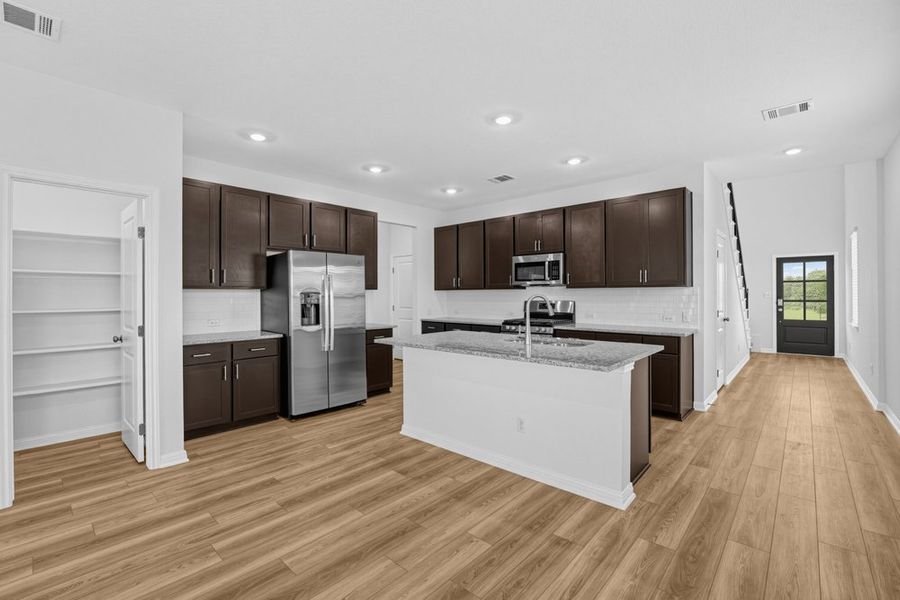 Furnished interior view inside a new home in Sunfield, Buda (Image 4).