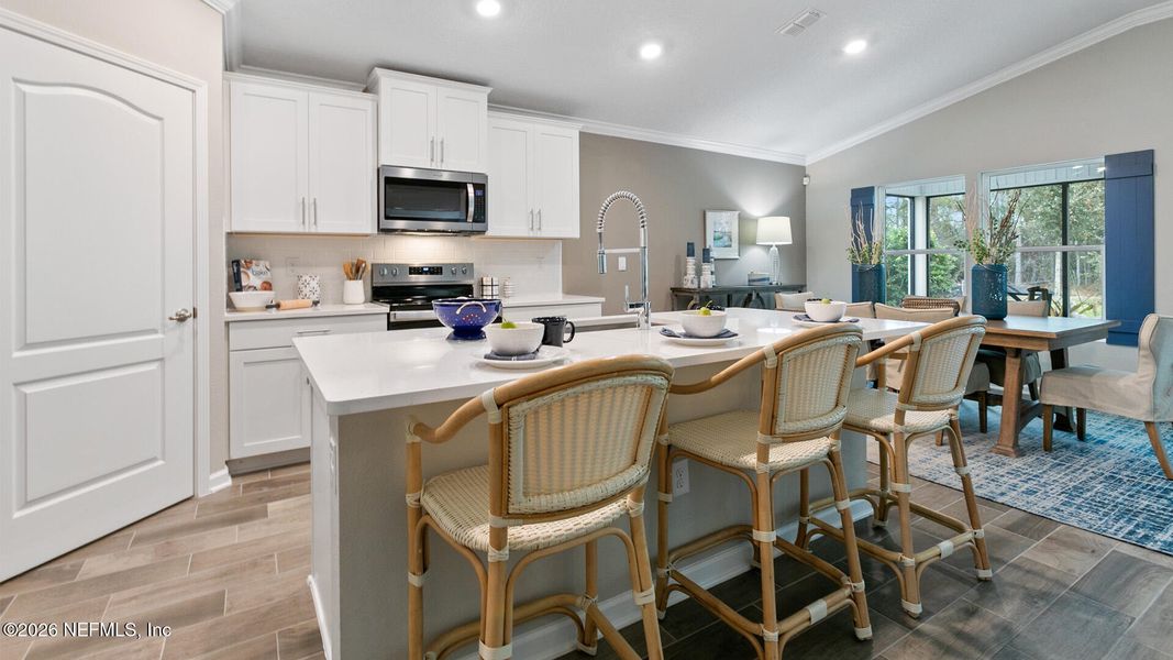 Furnished interior view inside a new home in Sawmill Branch, Palm Coast (Image 6).