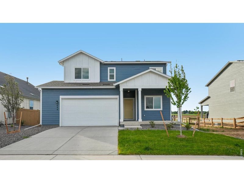 Front exterior of a new home in Granary, Johnstown, CO, highlighting curb appeal (Image 20).