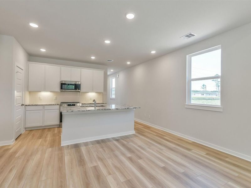 Furnished interior view inside a new home in Spring Branch Crossing, Conroe (Image 14).