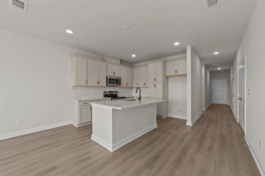Furnished interior view inside a new home in Blue Heron Retreat, Little River (Image 8).