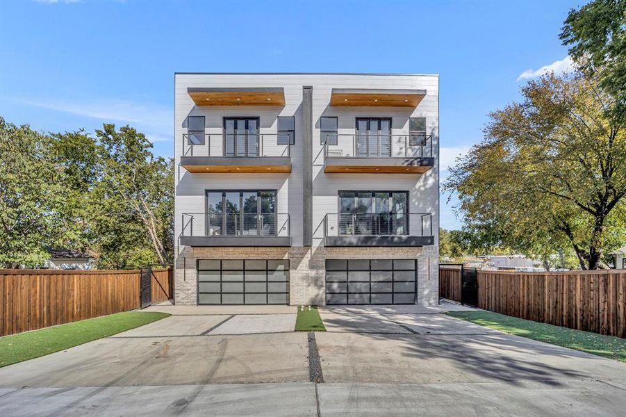 Modern home featuring a balcony and a garage