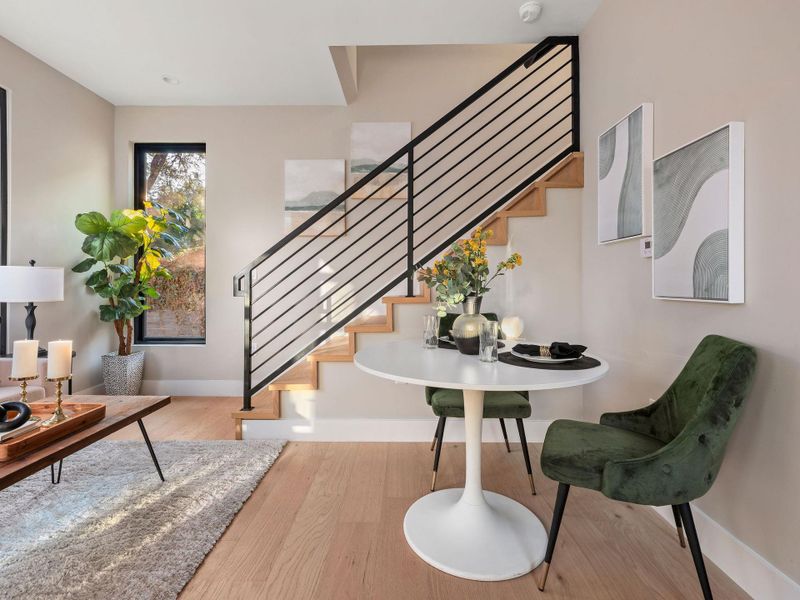 Foyer entrance with stairs and light wood-type flooring