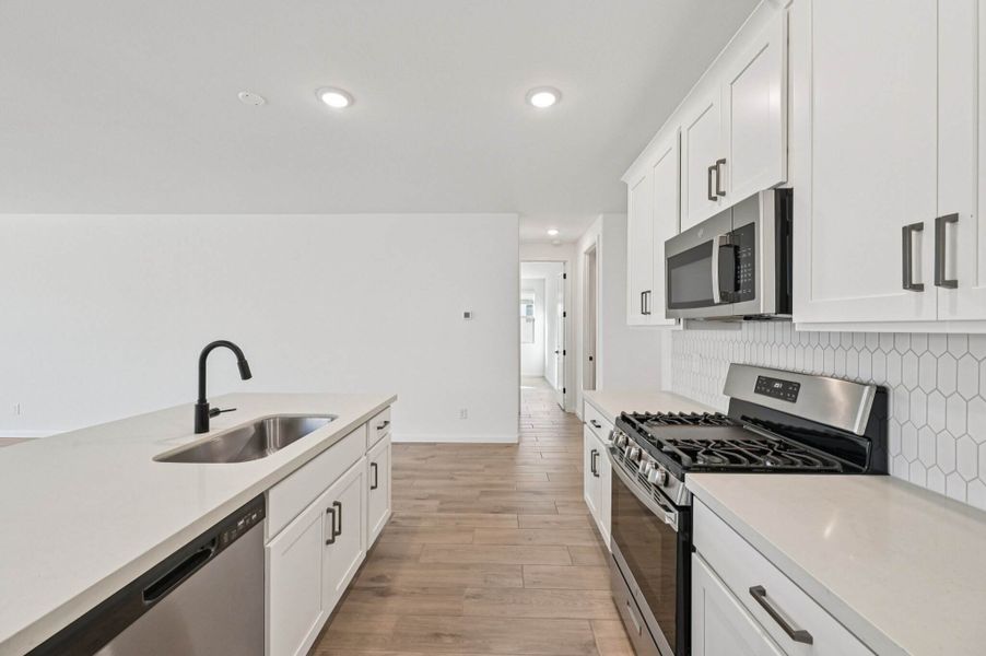 Kitchen featuring the Harmony Collection. Finishes and options may vary by community.