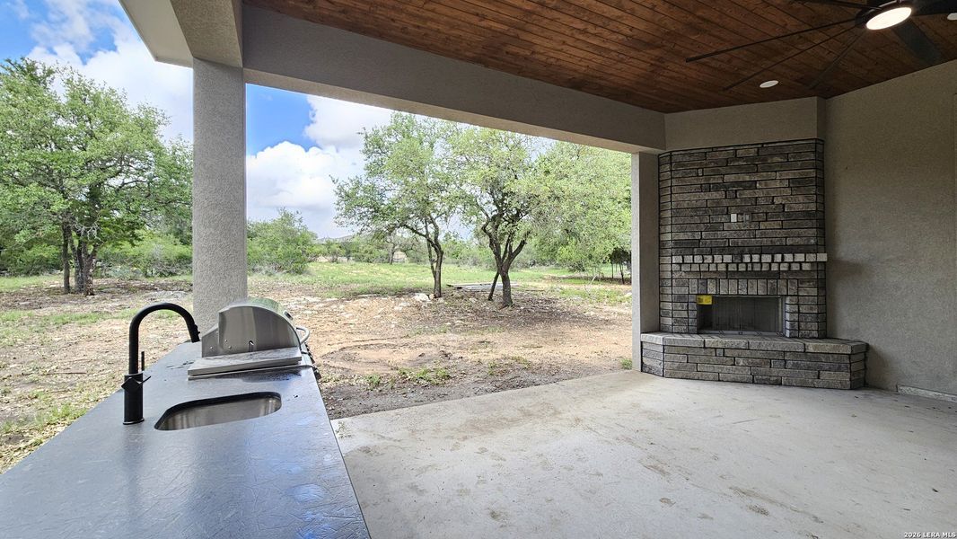 Exterior details and patio area of a home in , New Braunfels (Image 33).