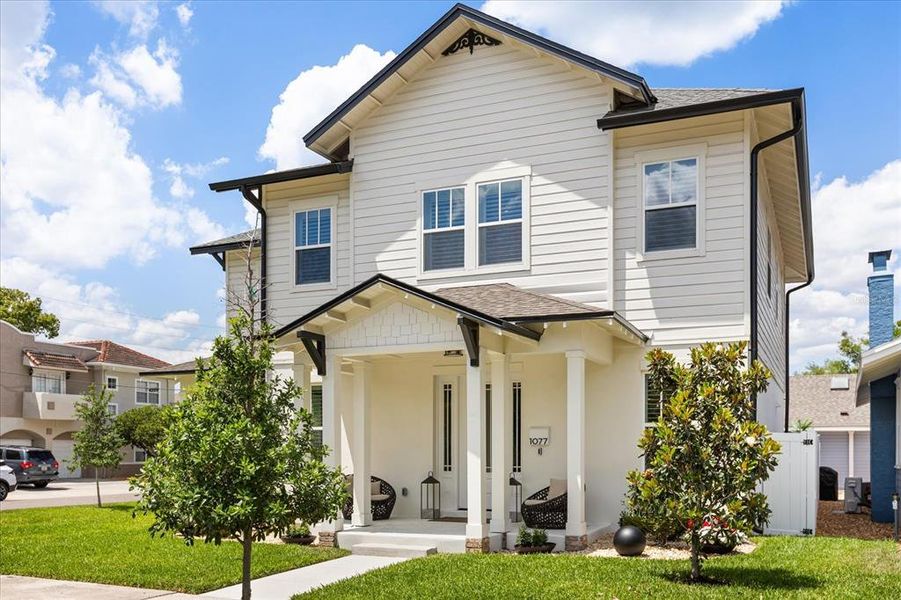 Front exterior of a new home in , Winter Park, FL, highlighting curb appeal (Image 27).