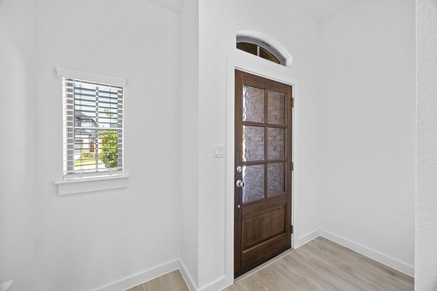 Entry in the Pecan II home plan by Trophy Signature Homes – REPRESENTATIVE PHOTO Entry in the Pecan II home plan by Trophy Signature Homes – REPRESENTATIVE PHOTO