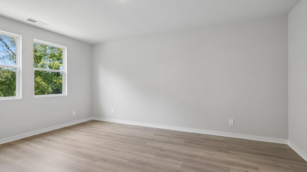 Representative unfurnished interior of a home built from the Ansley by D.R. Horton in Harvest Point, Spring Hill (Image 57).