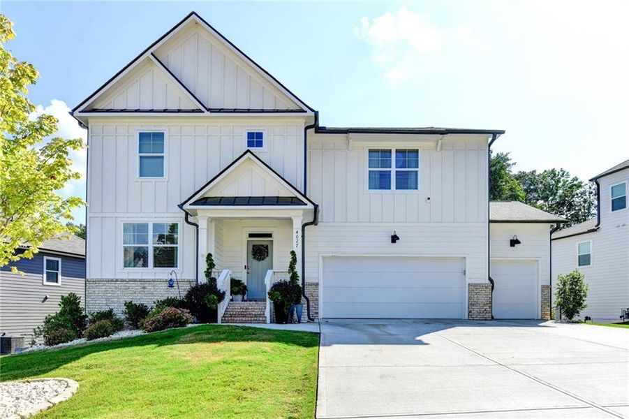 Front exterior of a new home in , Gainesville, GA, highlighting curb appeal (Image 1). Front exterior of a new home in , Gainesville, GA, highlighting curb appeal (Image 1).