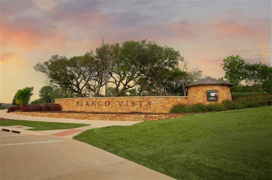 Front exterior of a new home in Blanco Vista, San Marcos, TX, highlighting curb appeal (Image 1).
