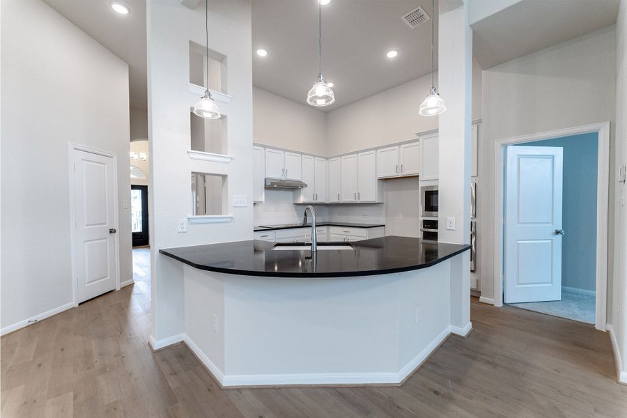 Furnished interior view inside a new home in The Woodlands at Medina Hills, Mico (Image 3).
