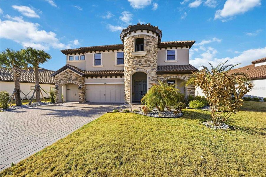 Front exterior of a new home in , Parrish, FL, highlighting curb appeal (Image 21). Front exterior of a new home in , Parrish, FL, highlighting curb appeal (Image 21).