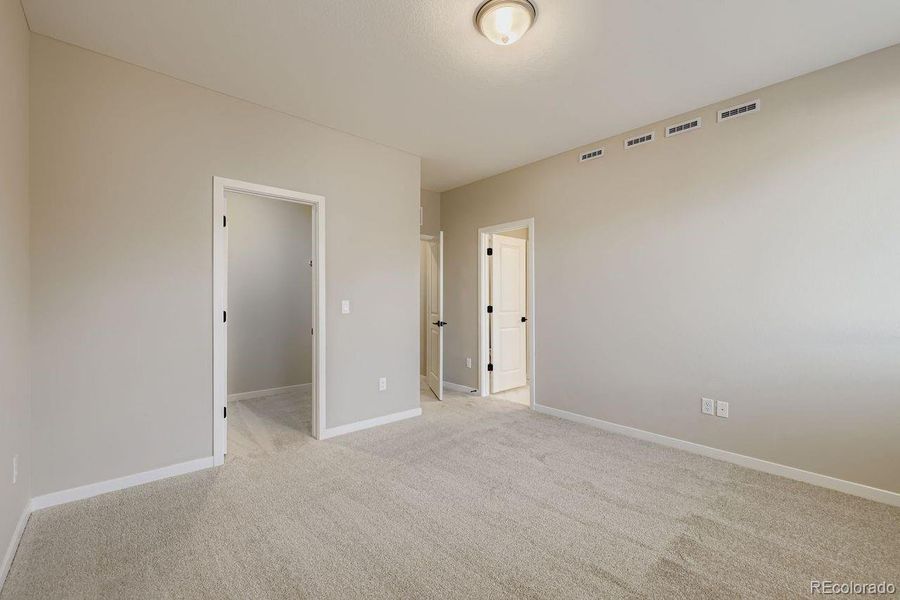 Staged primary bedroom