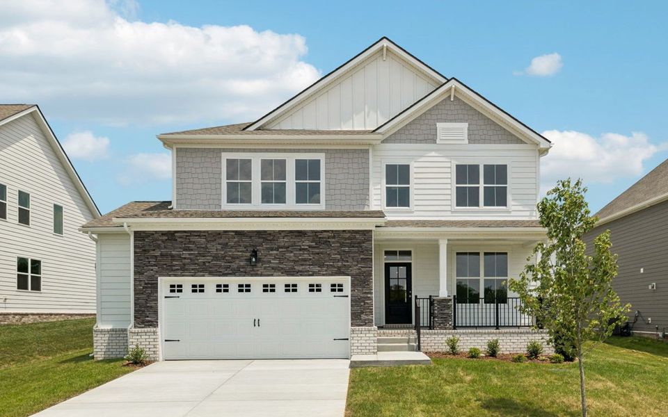 Representative exterior photo of a completed home built from the Macon by Ashton Woods in Ascent at Arbor Ridge, La Vergne, TN (Image 1).