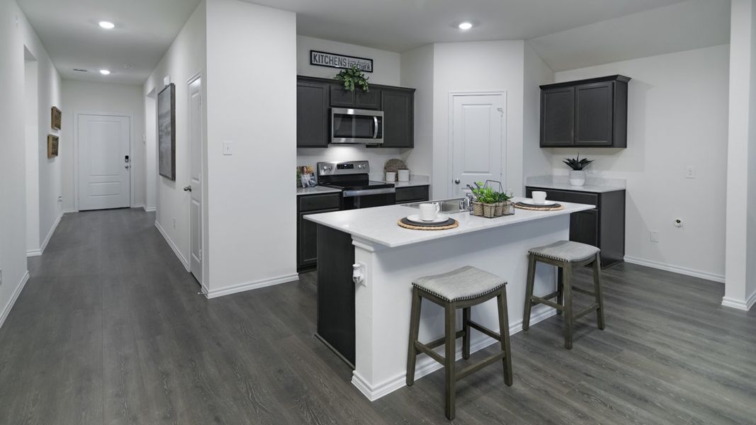 Representative furnished interior of a home built from the X40J Justin by D.R. Horton in Valor Farms, Royse City (Image 8).