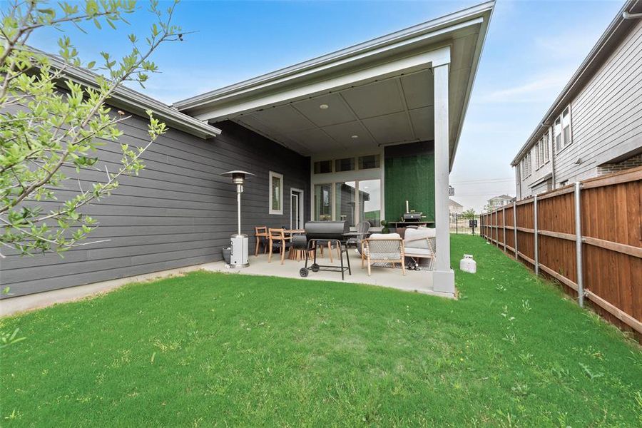 Exterior details and patio area of a home in Karis - Village Series, Crowley (Image 24). Exterior details and patio area of a home in Karis - Village Series, Crowley (Image 24).