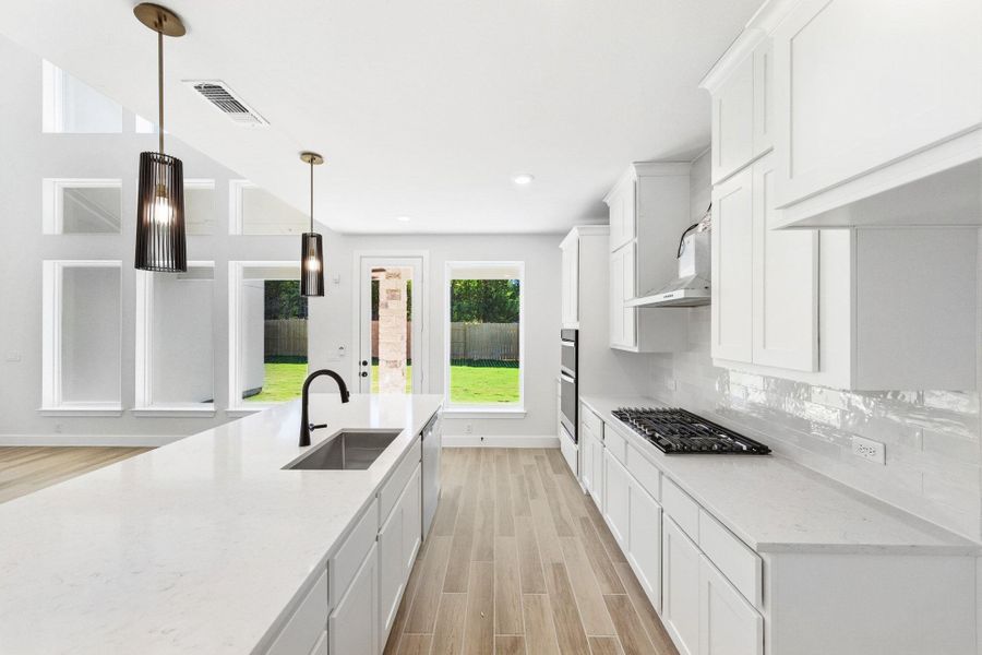 Furnished interior view inside a new home in The Colony, Bastrop (Image 12).