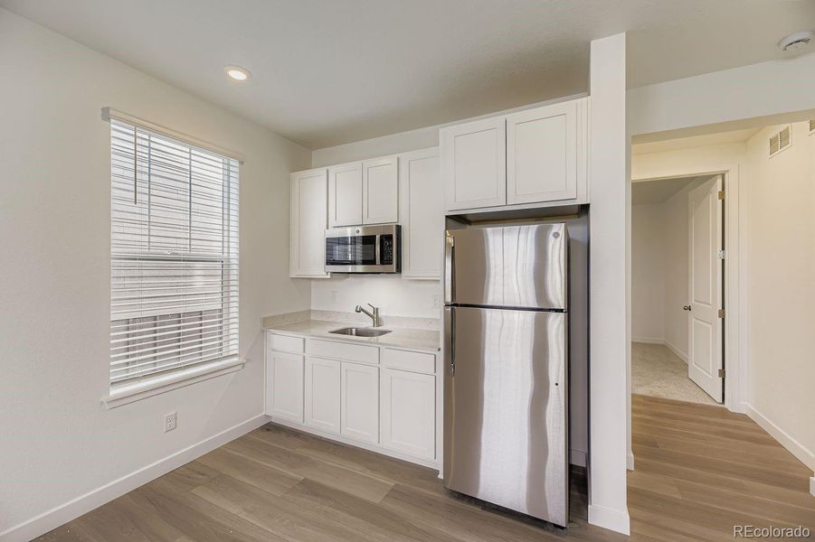 Furnished interior view inside a new home in Newlin Crossing: The Monarch Collection, Parker (Image 4). Furnished interior view inside a new home in Newlin Crossing: The Monarch Collection, Parker (Image 4).