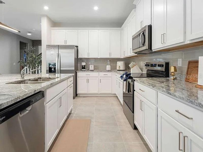 Furnished interior view inside a new home in , Kissimmee (Image 16).
