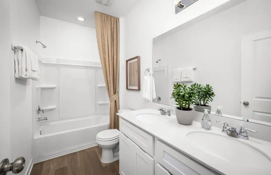 Representative furnished interior of a home built from the Afton by Pulte Homes in Saddleback at Santa Rita Ranch, Liberty Hill (Image 6).