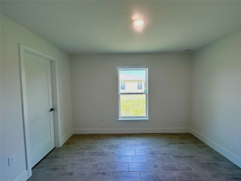 Spacious, unfurnished interior of a new home in Deep Creek, Punta Gorda (Image 18).