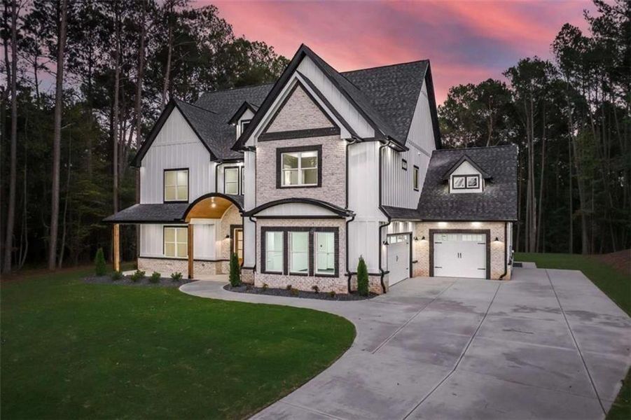 Front exterior of a new home in , Winder, GA, highlighting curb appeal (Image 31).