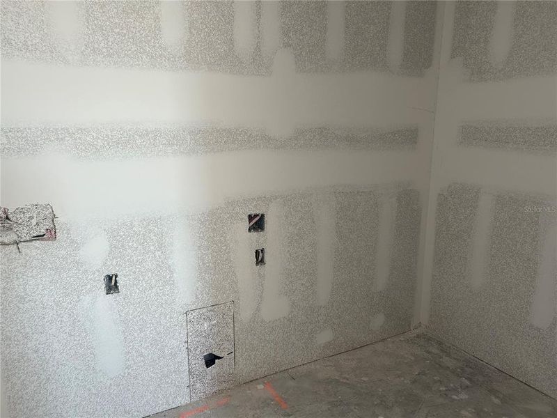 In-progress construction of a new home in Oakfield Trails Signature, Parrish, FL (Image 24).