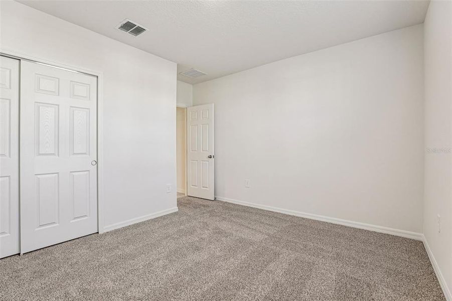 Spacious, unfurnished interior of a new home in Lawson Dunes - Signature Series, Haines City (Image 37). Spacious, unfurnished interior of a new home in Lawson Dunes - Signature Series, Haines City (Image 37).