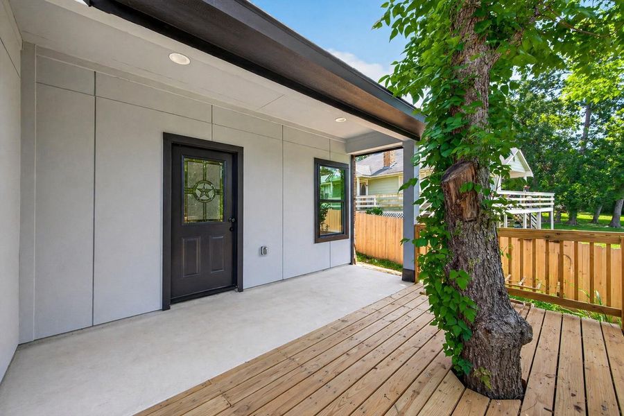 Large covered patio  for outdoor relaxation or entertaining.