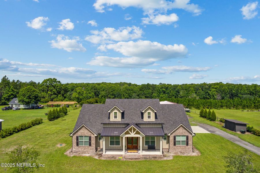 Front exterior of a new home in , Hilliard, FL, highlighting curb appeal (Image 19).