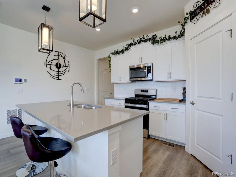 Furnished interior view inside a new home in Crystal Valley Pine Ridge, Castle Rock (Image 13).