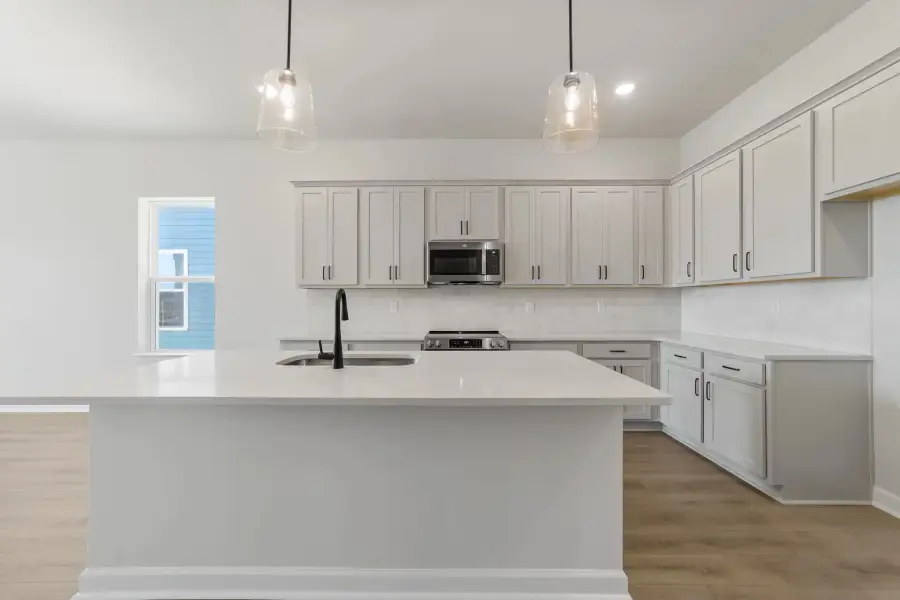 Sample Kitchen photo. Actual structural options and design finishes of home may vary.