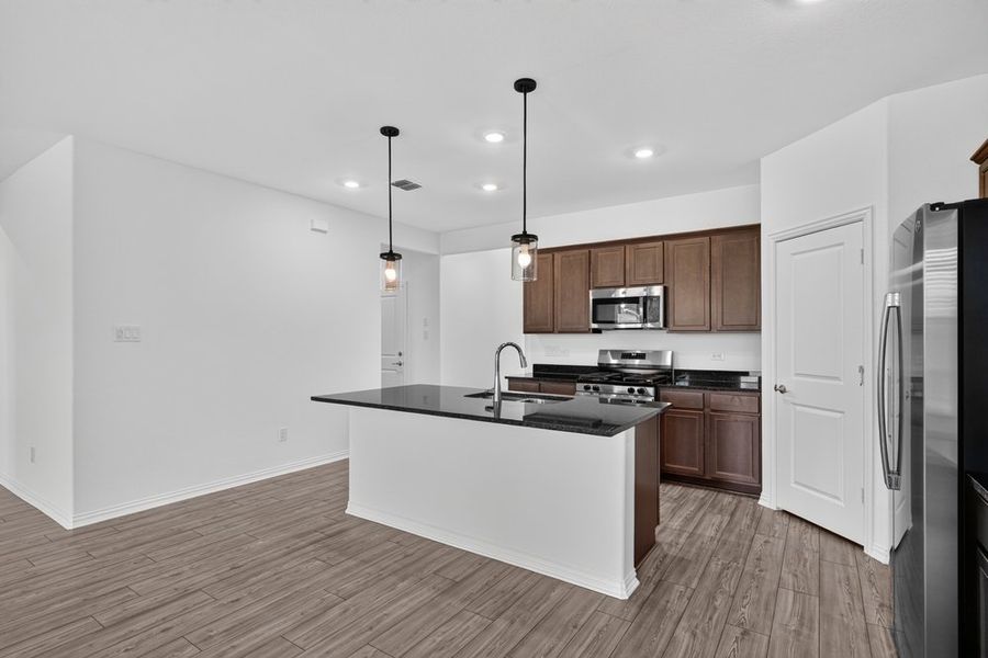 Furnished interior view inside a new home in River Ridge, Crandall (Image 6).