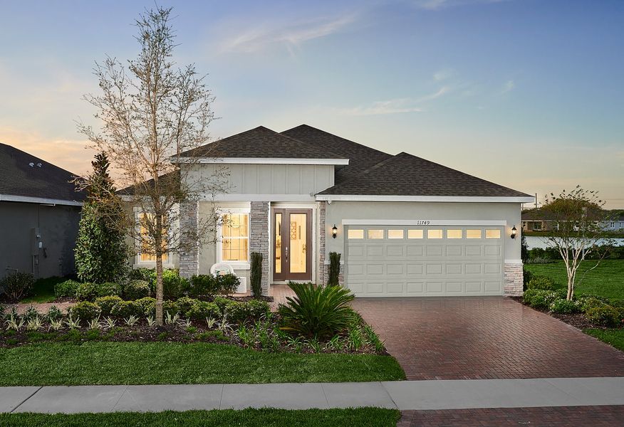 Representative exterior photo of a completed home built from the Margate II by Park Square Residential in Summerbrooke, Mount Dora, FL (Image 1).